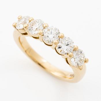 Half eternity ring in 18K gold set with brilliant-cut diamonds.
