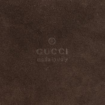 Gucci, a Bamboo suede bag.