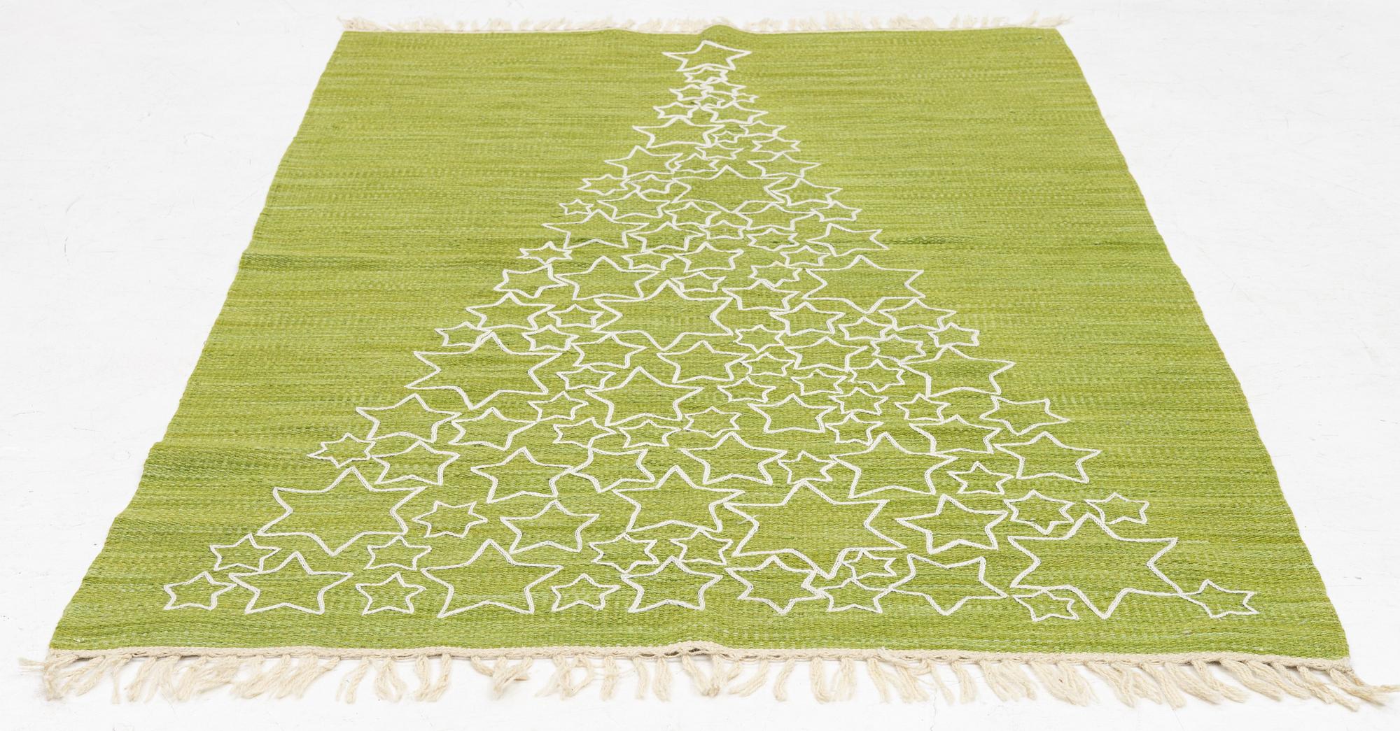 A hand-embroidered Kelim rug, c. 184 x 115 cm.