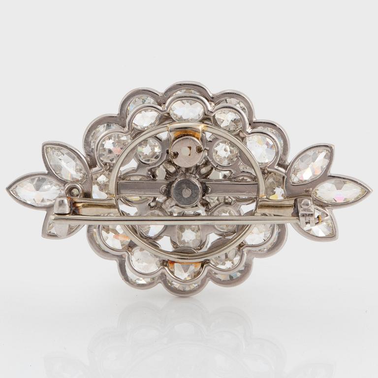 A platinum brooch set with old-cut diamonds with a total weight of ca 19.00 cts, possibly Cartier or retailed by Cartier.