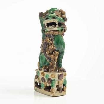A Sancai glazed Buddhist lion incense/joss stick holder, Qing dynasty, Kangxi (1662-1722).