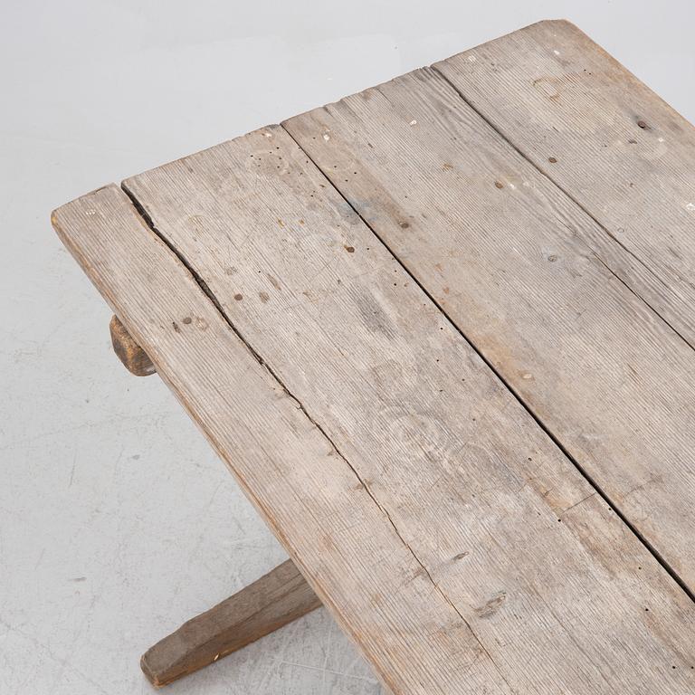 A wooden table, circa 1900.