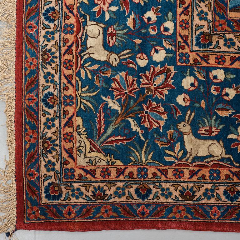 A carpet, a semi-antique Kashan, a so called Dabir, ca 383,5-387,5 x 269,5-275 cm.