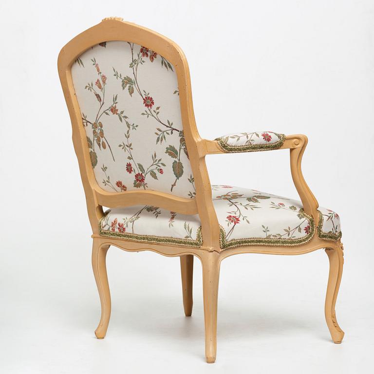 A Louis XV armchair.