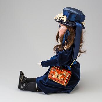 A bisque head doll, Germany, 1910s.