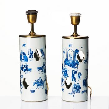 A pair of blue and white vases made in to lamps, late Qing dynasty, 19th Century.