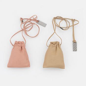 Gucci, a par of collarbags in pink and beige leather.