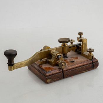 A telegraph from LM Ericsson and a telegraph key from Lindholm & Wikström, early 20th Century.