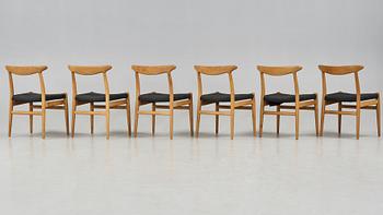 Hans J. Wegner, a set of six oak dining chairs, C. M. Madsen, Denmark 1950's-60's.