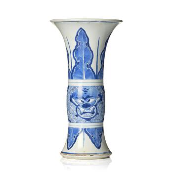 1094. A blue and white Gu shaped vase, Qing dynasty, Kangxi (1662-1722).