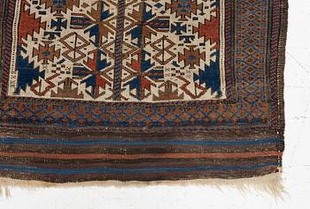 An antique Baluch rug, East Persia, c. 147 x 45 cm.