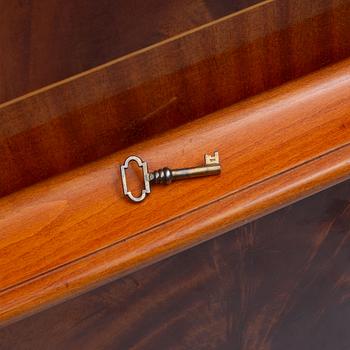 A Swedish Modern cabinet, mid 20th Century.