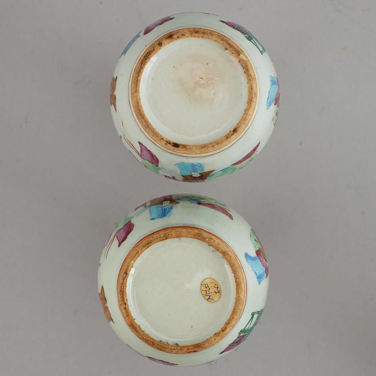 A pair of famille rose vases, and a tea pot, Qing dynasty, 19th Century and circa 1900.