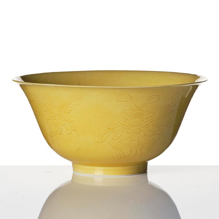 A yellow glazed 'prunus' bowl, Qing dynasty, 18th century.