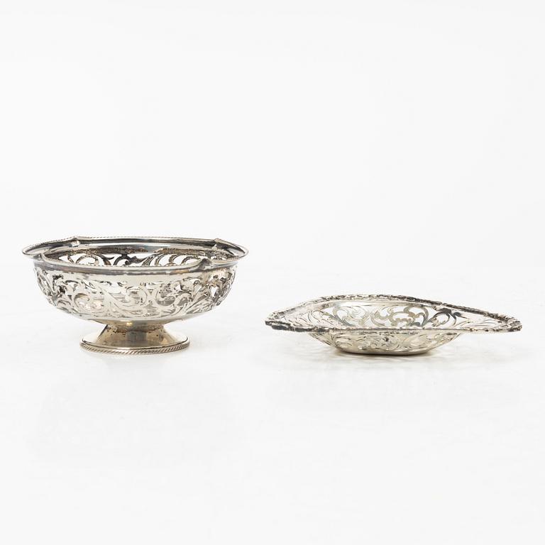 Two pierced silver bowls and two sugar spoons, including Sweden and Endland, 20th century.