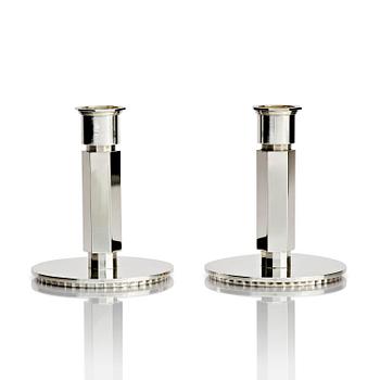 467. Wiwen Nilsson, a pair of sterling silver candlesticks, Lund, Sweden 11957 and 1960.