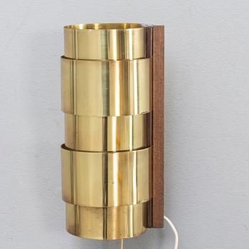 Wall lamps, a pair, brass, wood, probably Hans-Agne Jakobsson.