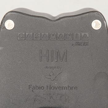 a pair of Italian black plastic chairs designed by Fabio Novembre "Him" and "Her" from the late 20th Century.