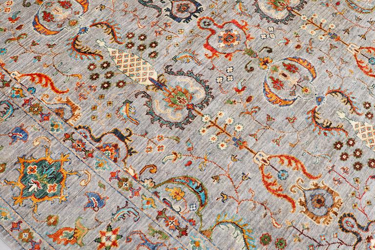 A rug, Ziegler design, approx. 240 x 172 cm.