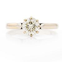 Ring, 18K white gold with brilliant-cut diamond.