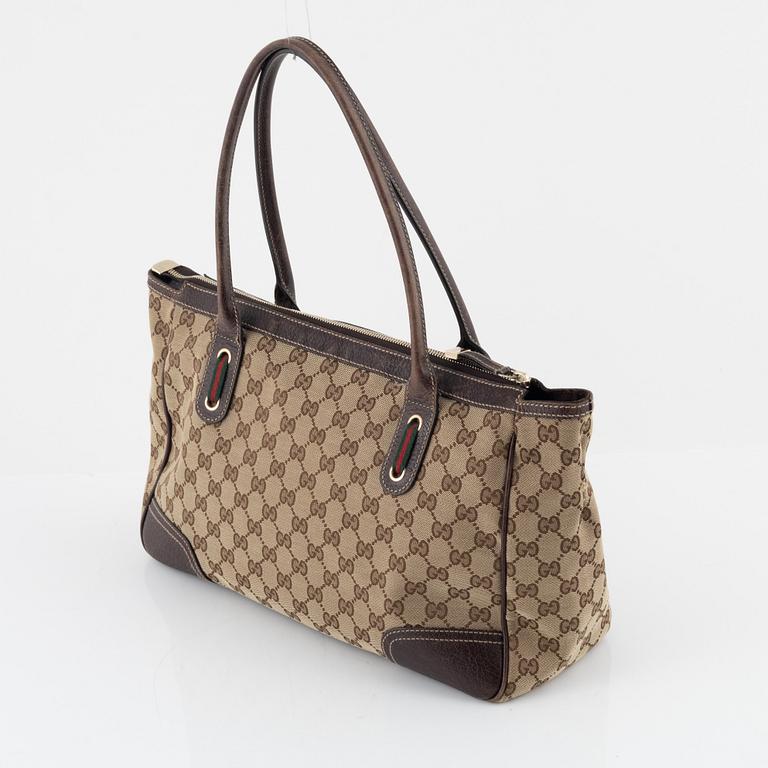 Gucci, a monogram canvas handbag.