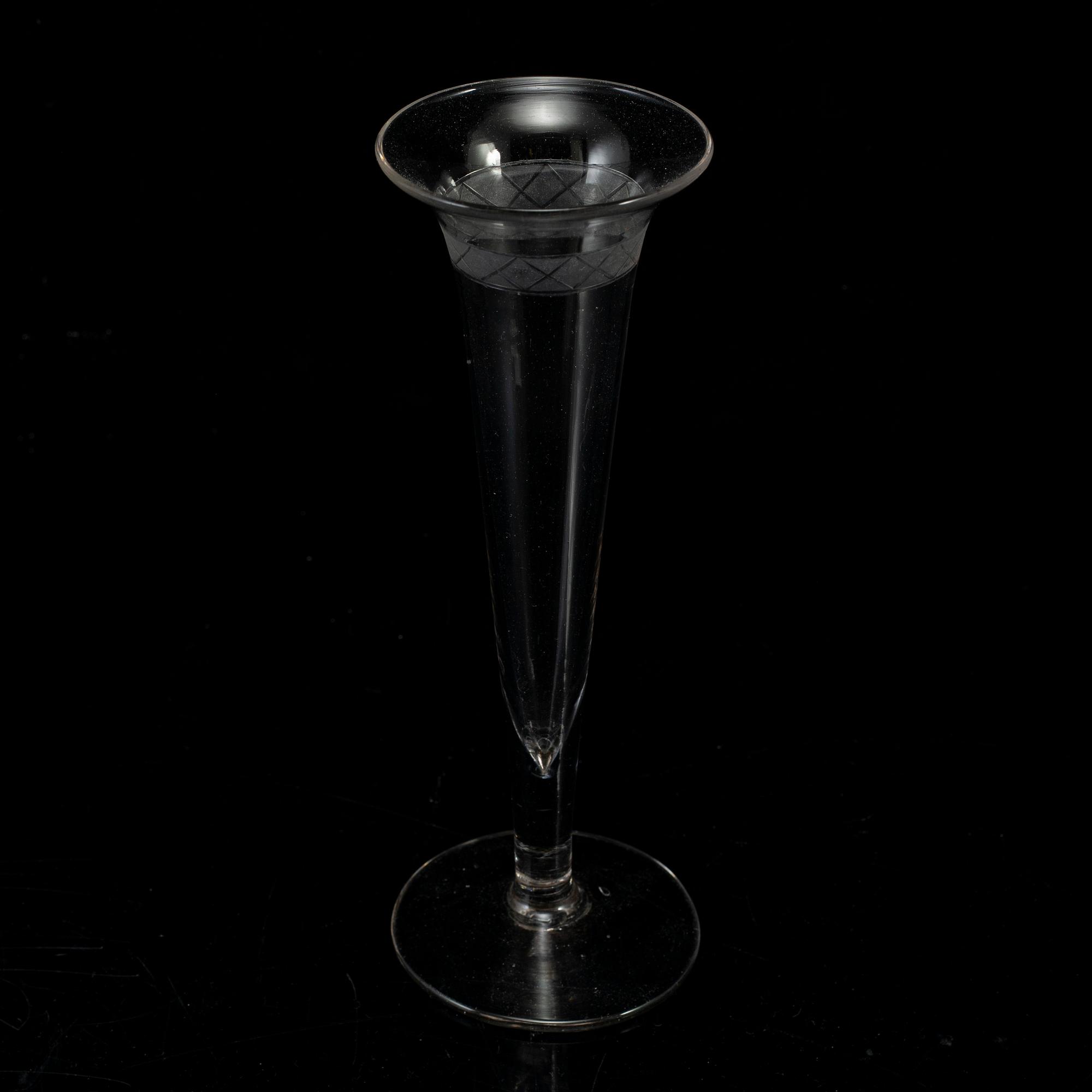 A group of six champagne glasses, circa 1800.
