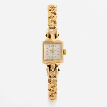 Gold Omega ladies watch.