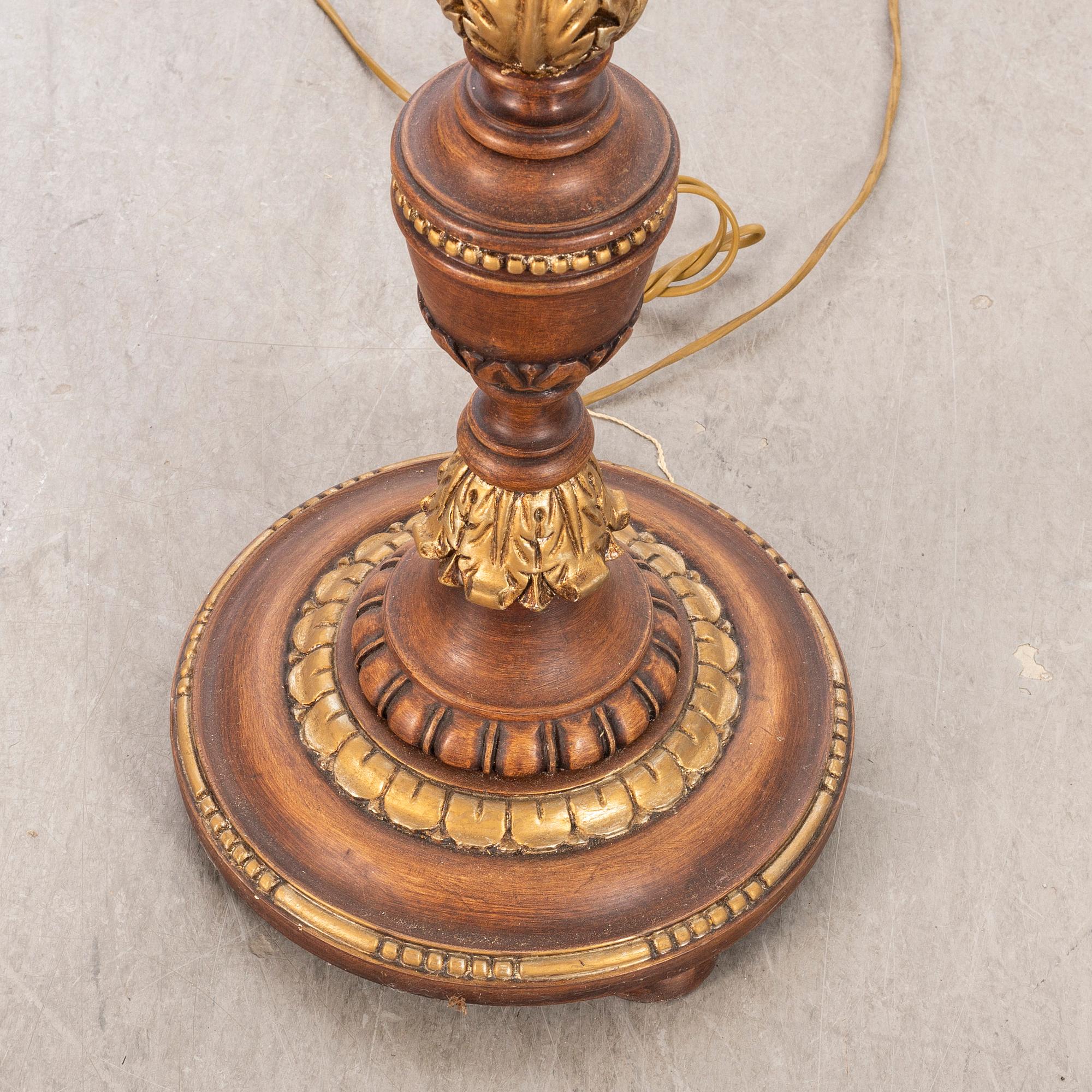 An mid 20th century wood floorlamp from Paoletti, Firenze Italy.