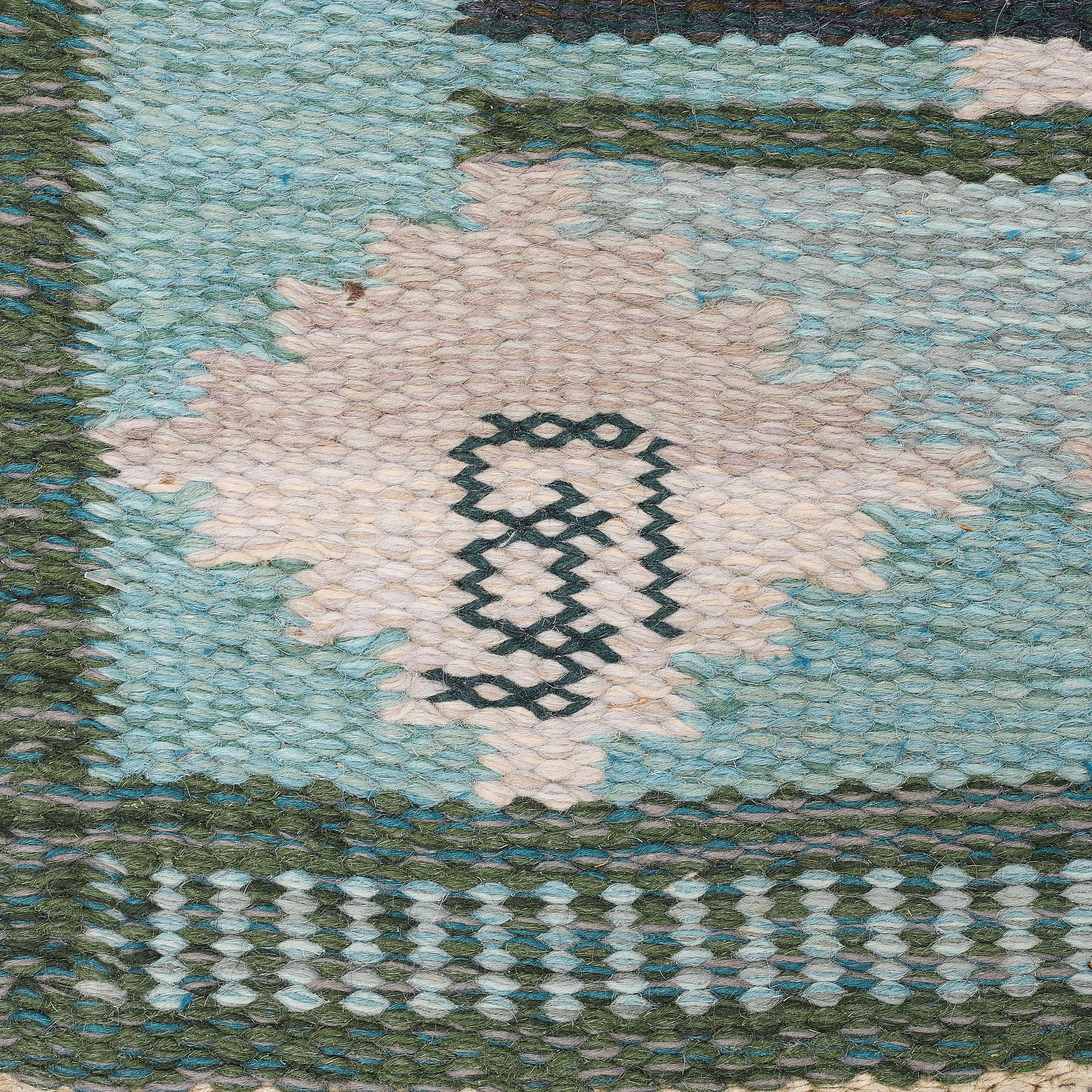 A carpet, flat weave, ca 203,5 x 138,5 cm, indistinct signature.