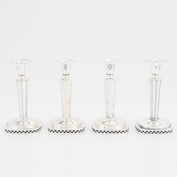 A set of four silver candlesticks by  Tesi, 1955-59.