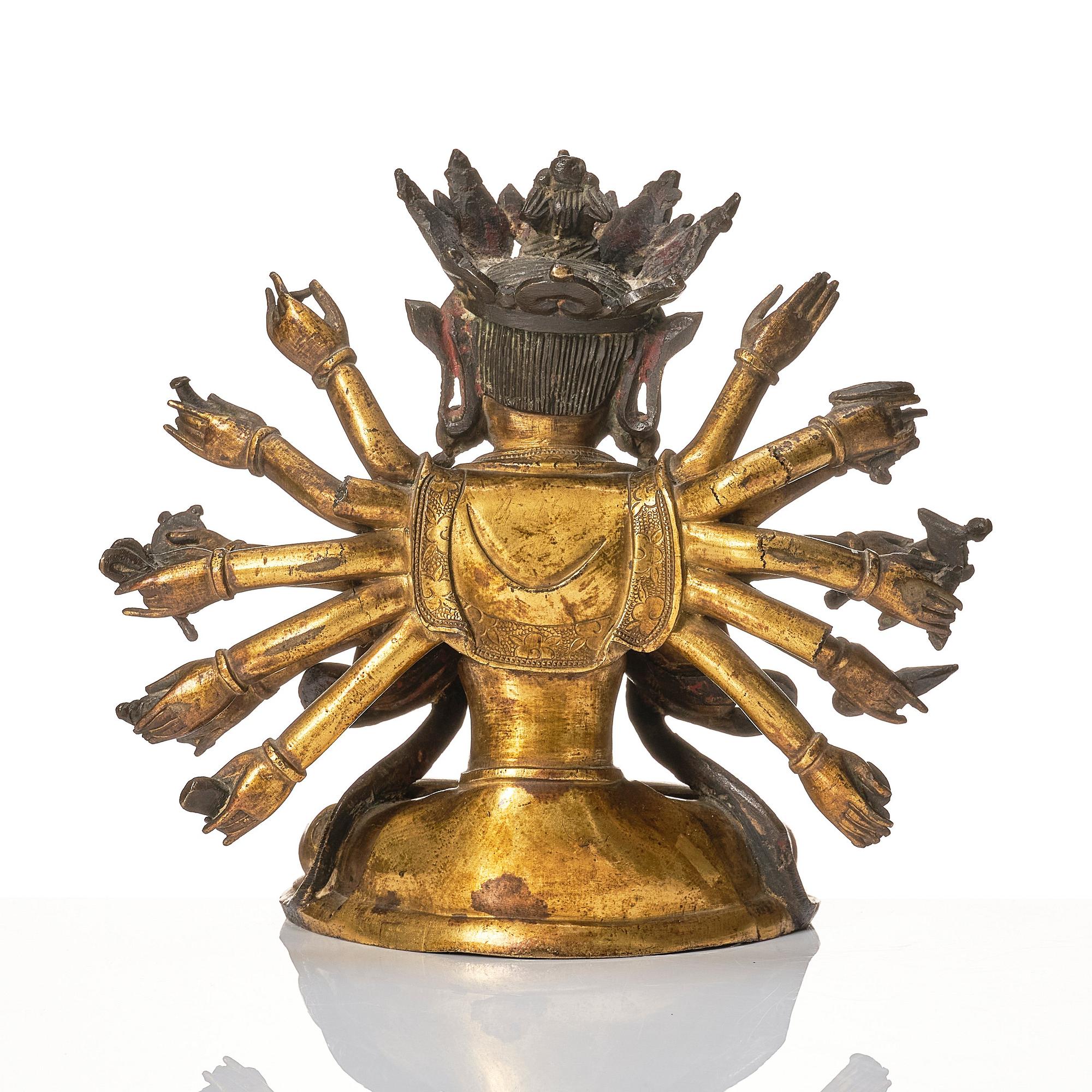 A gilt-bronze figure of a Boddhisattva, Ming dynasty (1638-1644).