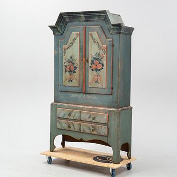 A painted Swedish cabinet from Jämtland, dated 1801.