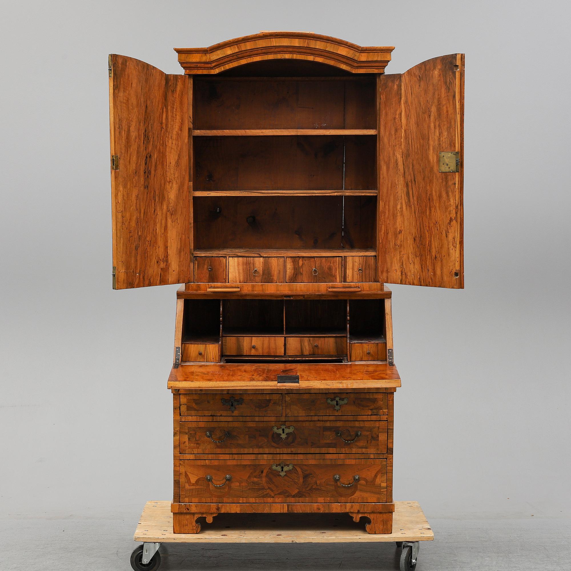 A veneered, barocque  writing cupbord.