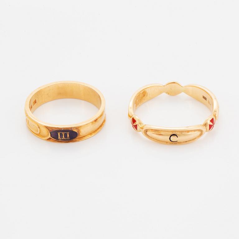 Two rings, 18K gold and enamel.
