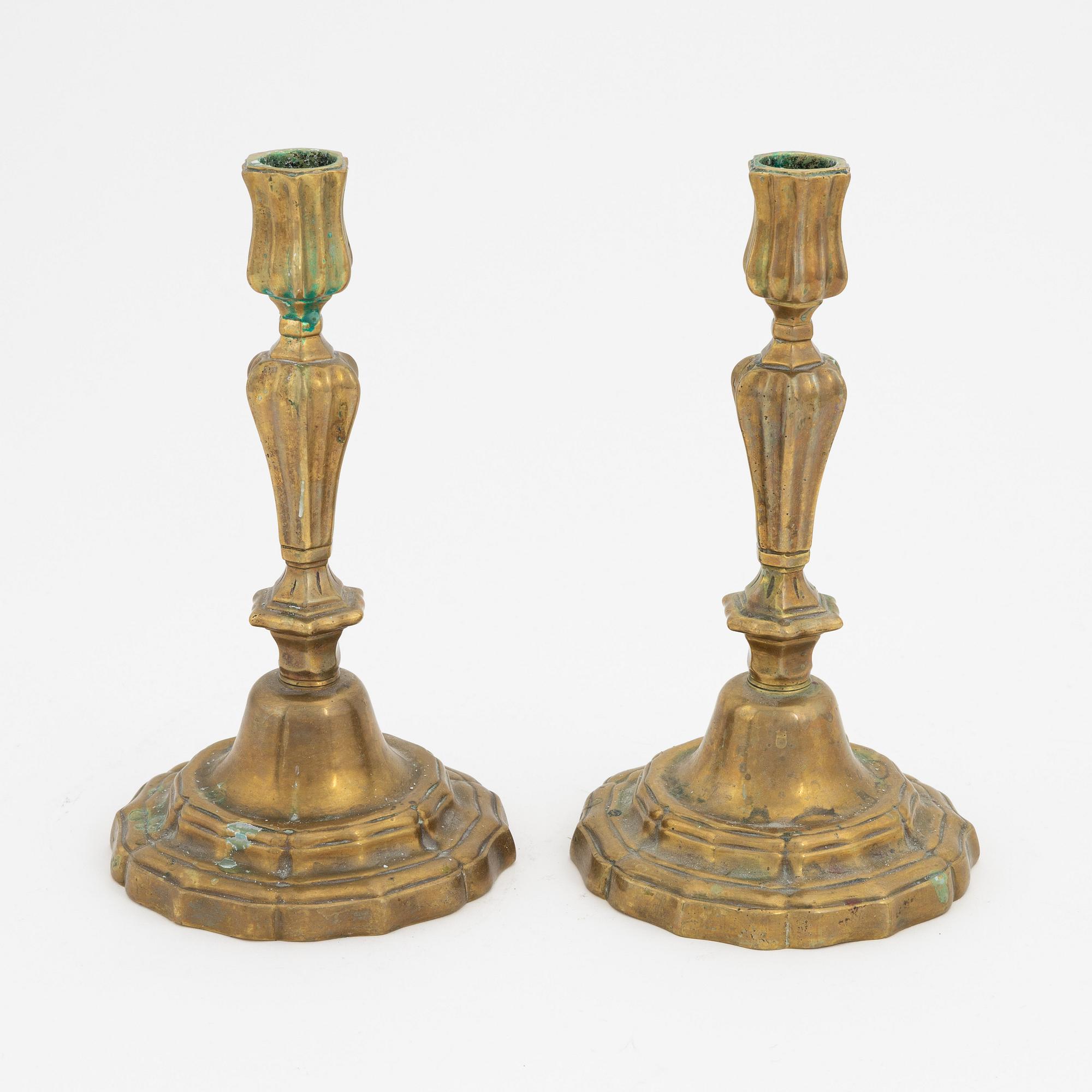 A pair of French brass candles sticks, 19th Century.