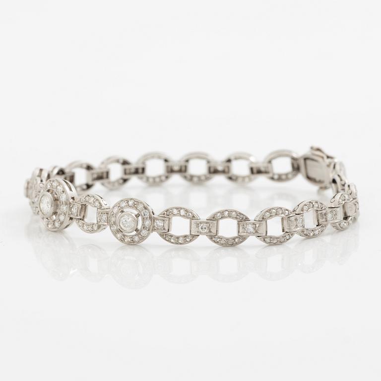 Bracelet in platinum set with round brilliant, octagonal, and rose-cut diamonds.