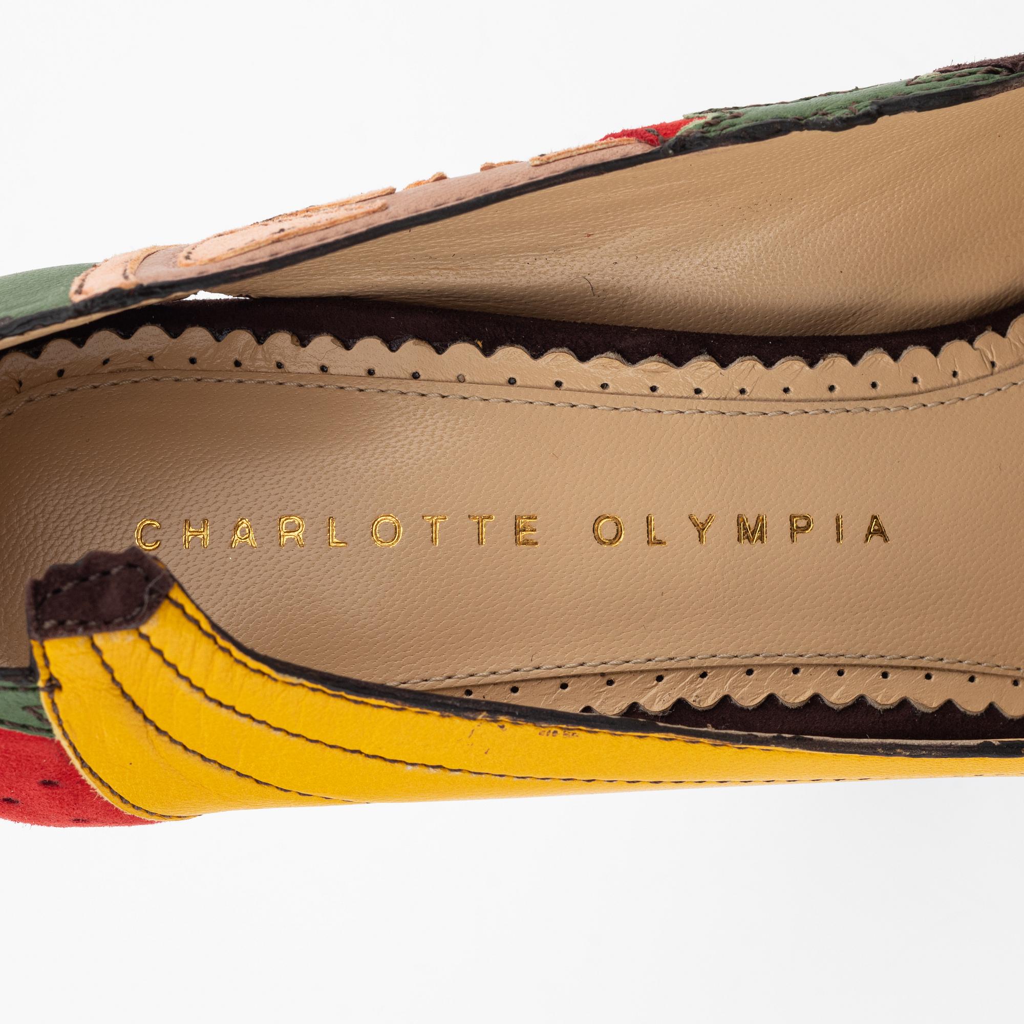 Charlotte Olympia, a pair of leather, suede and wood pumps, size 36.