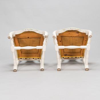 A pair of Rococo style armchairs, a pair of chairs, and a table, mid 20th century.