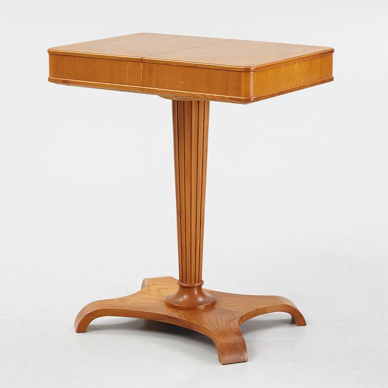 A Swedish Modern elm sewing table, Svenska Möbelfabrikerna, Bodafors, 1940's.