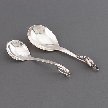 GEORG JENSEN, two sterling  silver serving spoons "Blossom", design no 84 and no 41, Copenhagen post 1945.