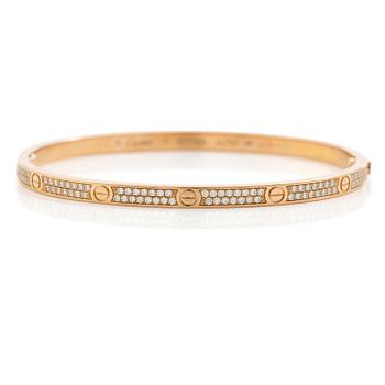 583. A Cartier bangle "Love" 18K rose gold with round brilliant-cut diamonds.