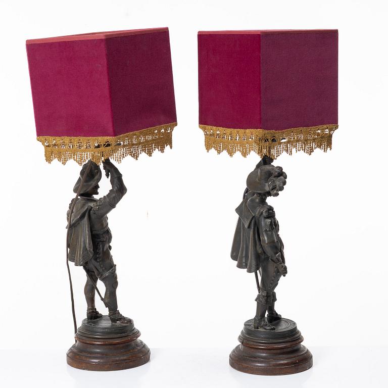 Auguste Poitevin, after, a pair of "Frondeur" sculptures/tablelamps, France, early 20th century.