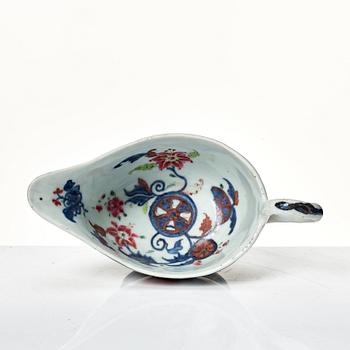 A famille rose "tobacco leaf" sauce boat, Qing dynasty, Qianlong (1736-95).