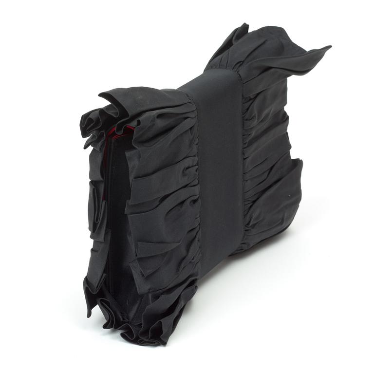 A black silk evening bag by Christian Dior.
