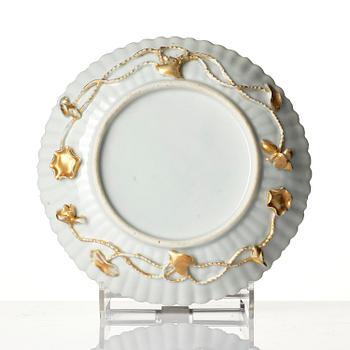 A tea pot with cover and stand, Qing dynasty, 18th century.