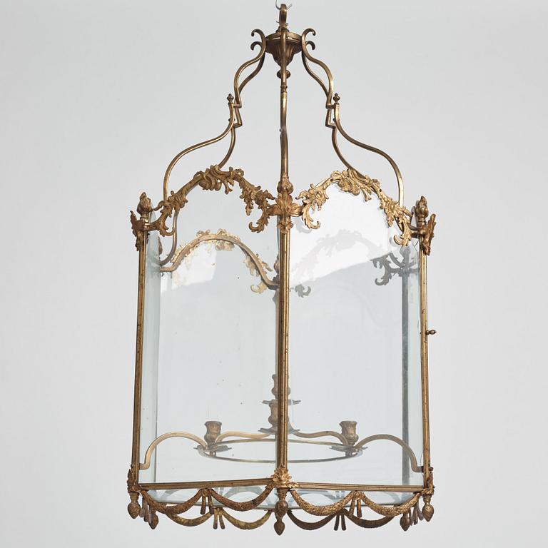 A Swedish rococo gilt-brass four-light lantern, possibly a masterpiece, Stockholm, later part of the 18th century.