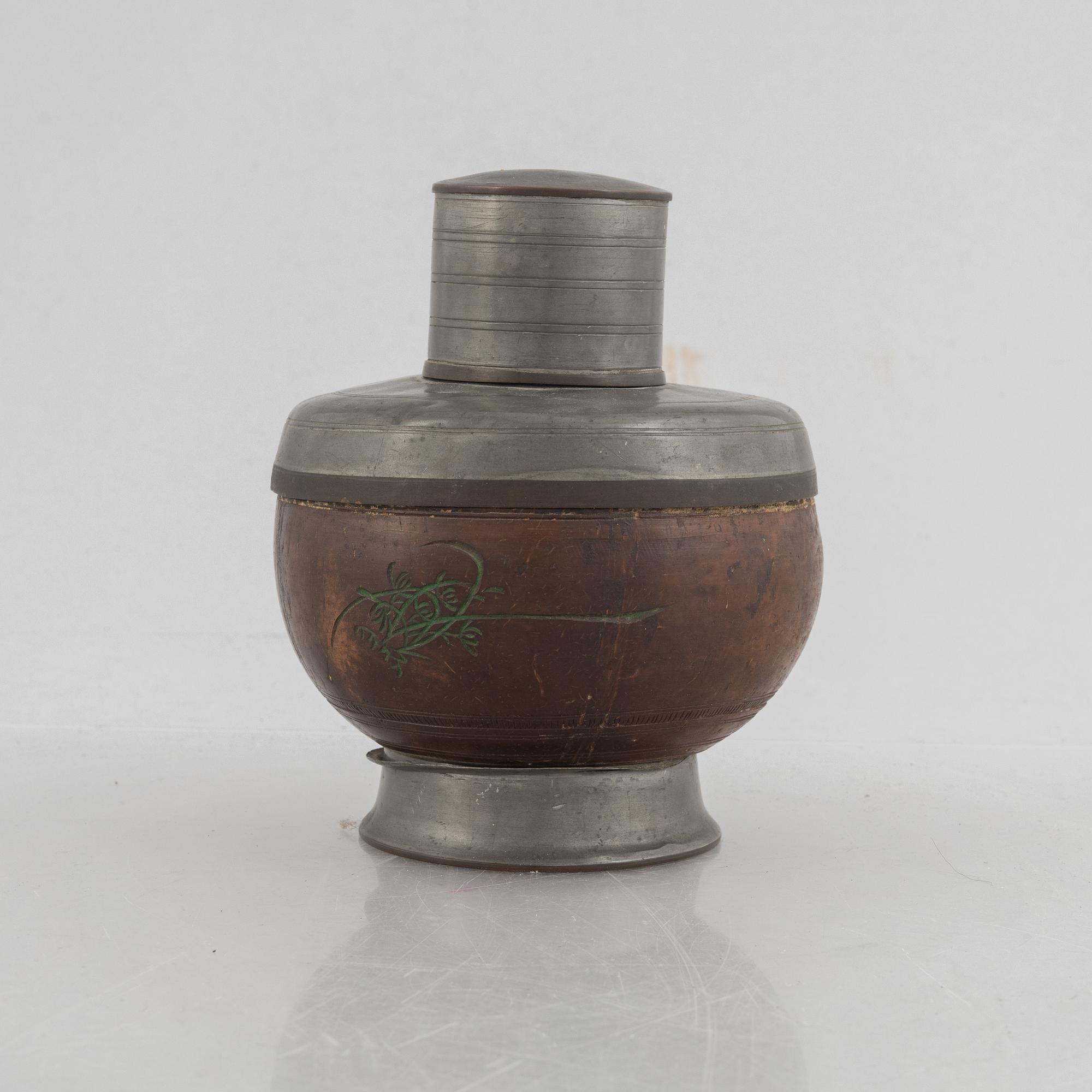 A Chinese pewter and wood tea caddie, early 20th century.