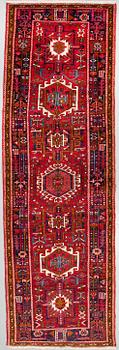 A Garadje runner, 335 x 102 cm.