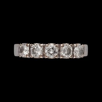 A brilliant-cut diamond eternity ring. Total carat weight circa 1.00 ct.
