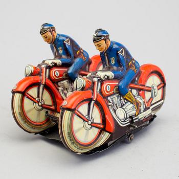 A tinplate synchronous motorcycle by Philipp Niedermeier, Germany, 1950s.